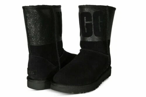 Black boots with a brand logo on a white background